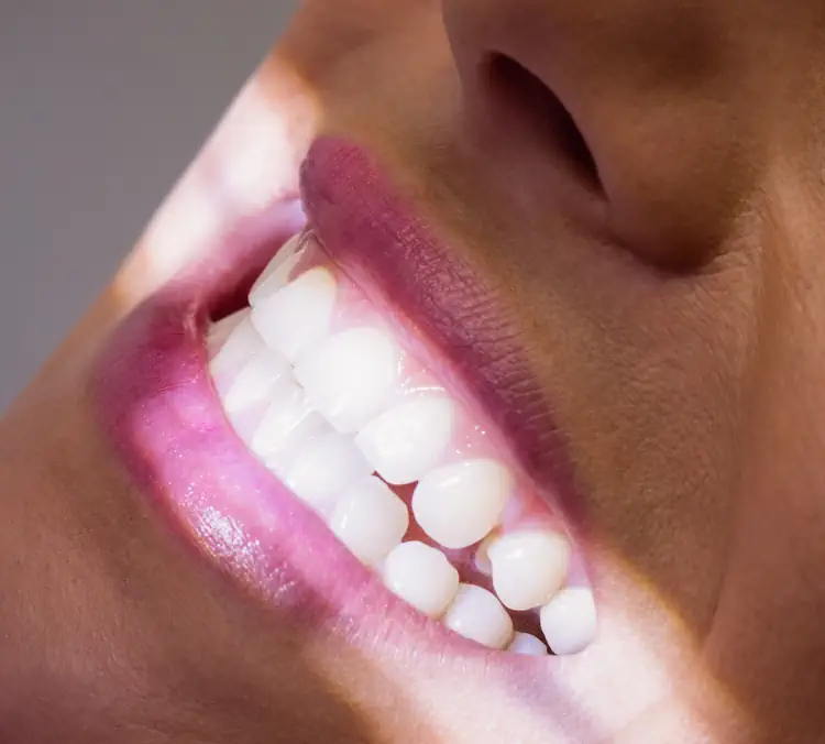 Female patient receiving dental treatment